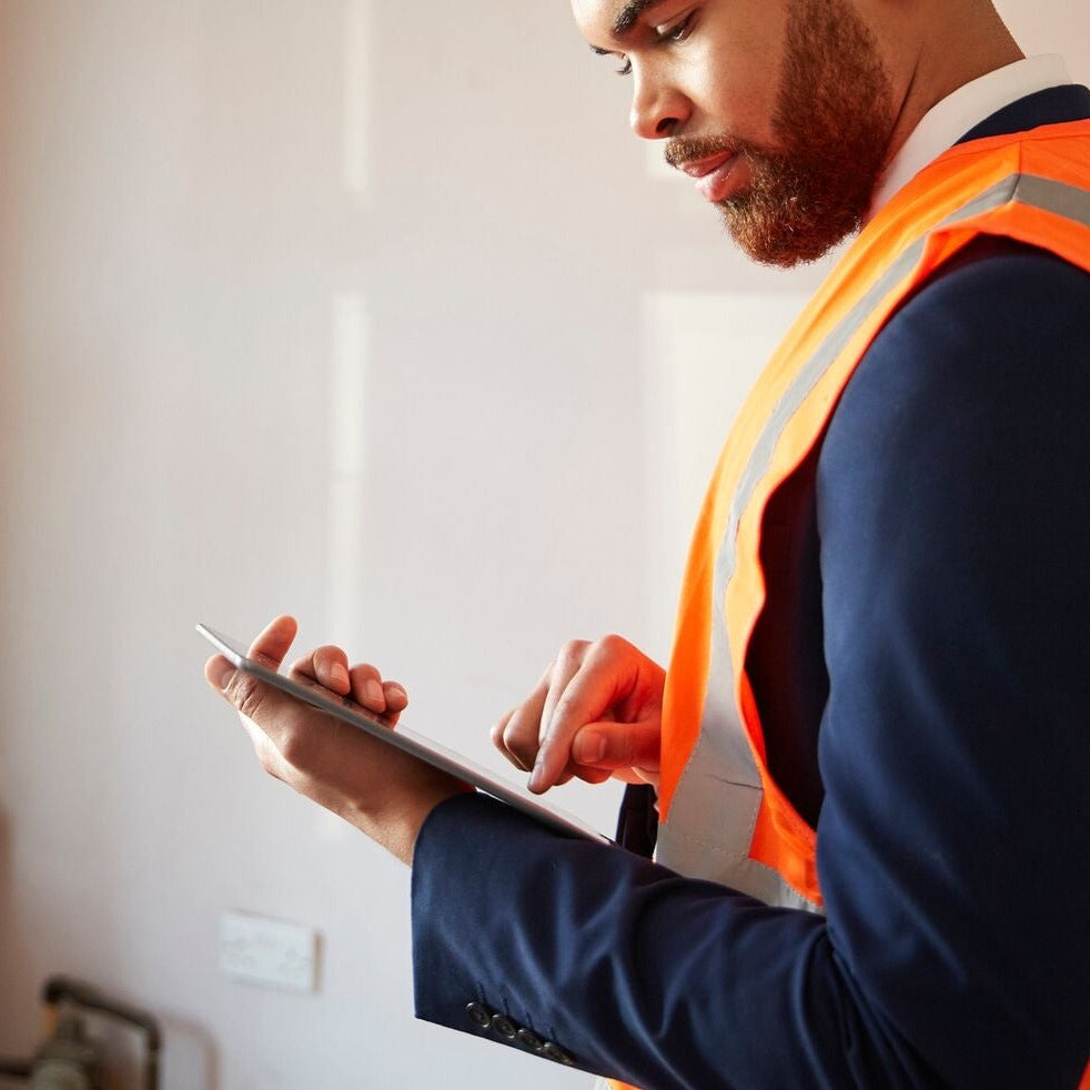 Surveyor carrying out a home condition report